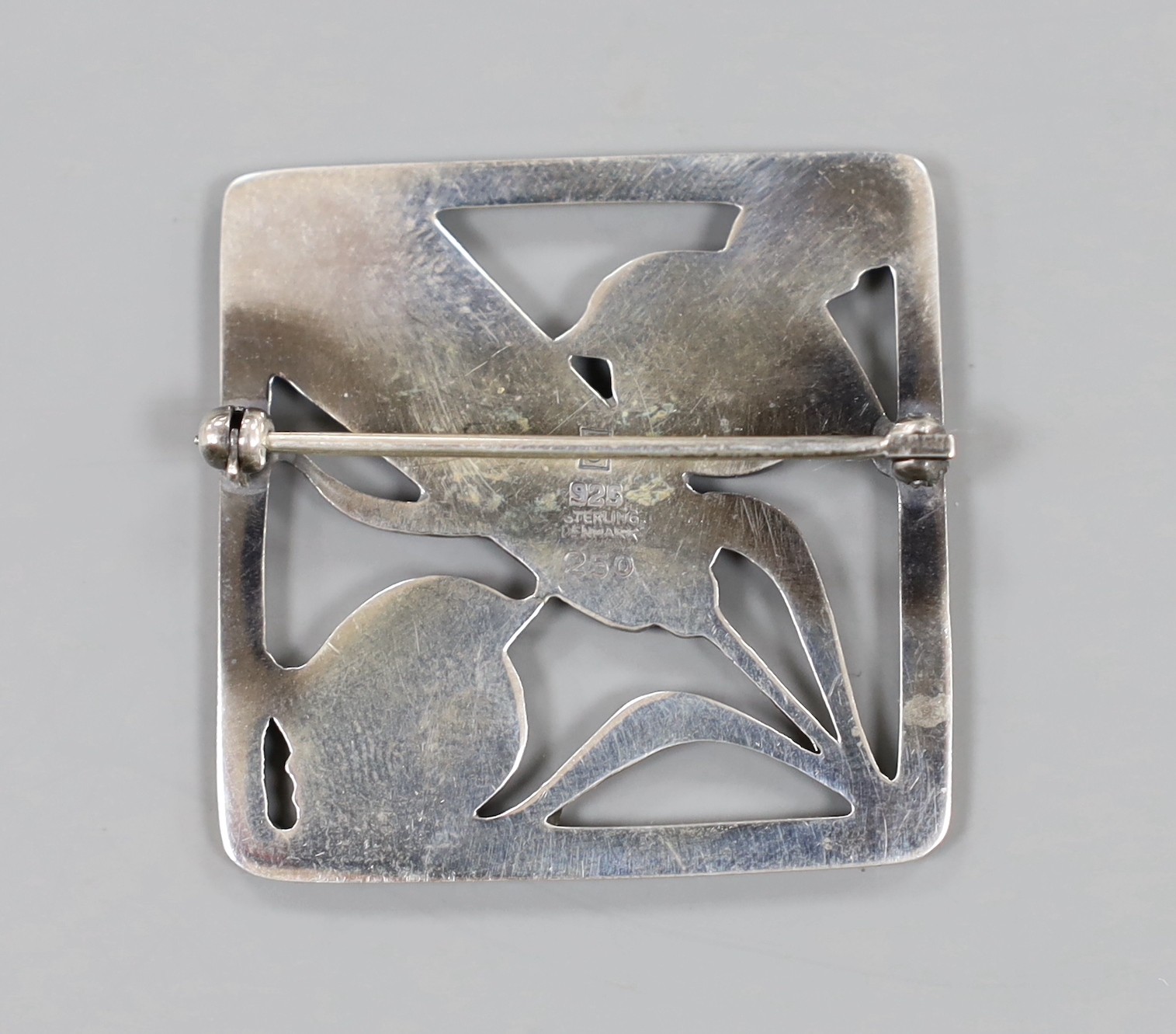 A Georg Jensen sterling square 'Robin and frond' brooch, no. 250, 36mm.